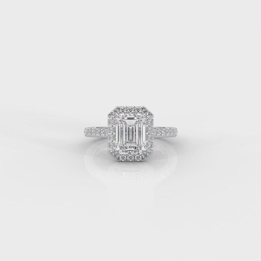 Diamond Ring Emeraldcut with Halo and Diamonds on Band